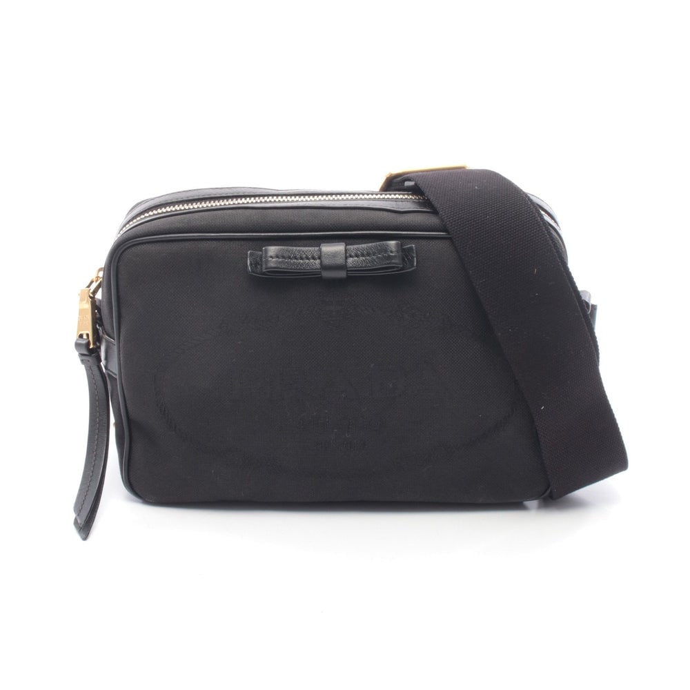Prada Logo Jacquard Shoulder Bag Black: Authenticated genuine Prada Logo jacquard shoulder bag in black canvas and leather. Approx. H15 x W21.5 top/22 base x D8 cm with 83-133 cm strap. Model and product numbers not listed.