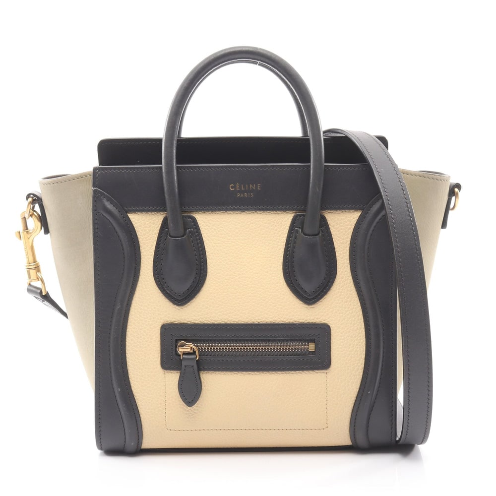 Celine Luggage Nano Shopper 2Way Bag: Authentic and authenticated Celine Luggage Nano Shopper 2WAY handbag in ivory, black, gray beige leather nubuck. Model 168243. Includes shoulder strap. H20 x W27/20 x D9 cm, strap 119 cm, handle 30