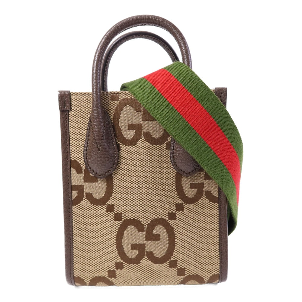 Gucci Jumbo GG 2Way Shoulder Bag: Authentic and authenticated Gucci Jumbo GG 2 way shoulder bag in brown GG canvas. Product 493075. Includes shoulder strap. W15.5 x H19 x D7 cm, handle 22 cm, shoulder 85-130 cm.