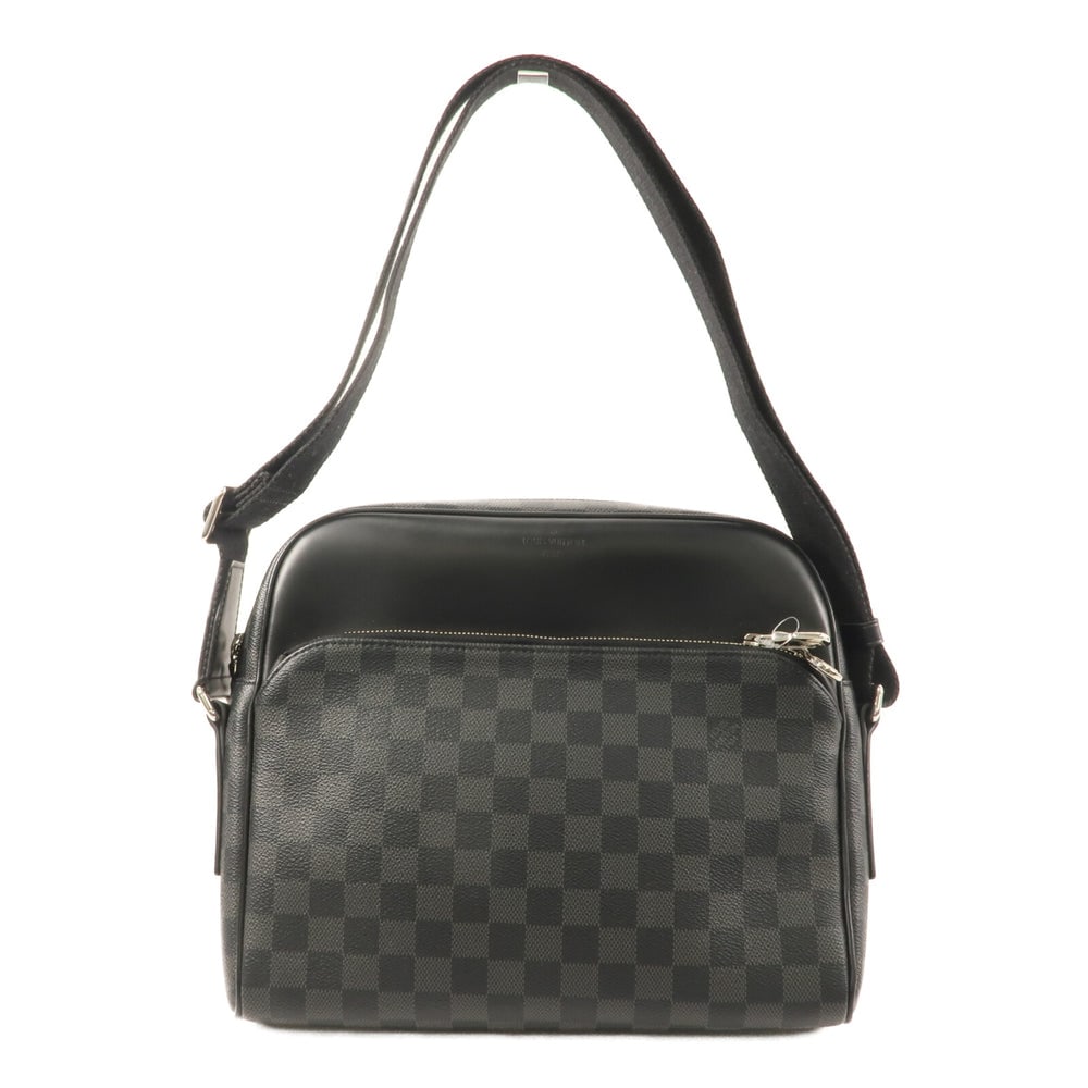Louis Vuitton Dayton Reporter: Dayton Reporter shoulder bag in black Damier Graphite coated canvas. Includes storage bags. Size 28 x 25 x 7 cm.