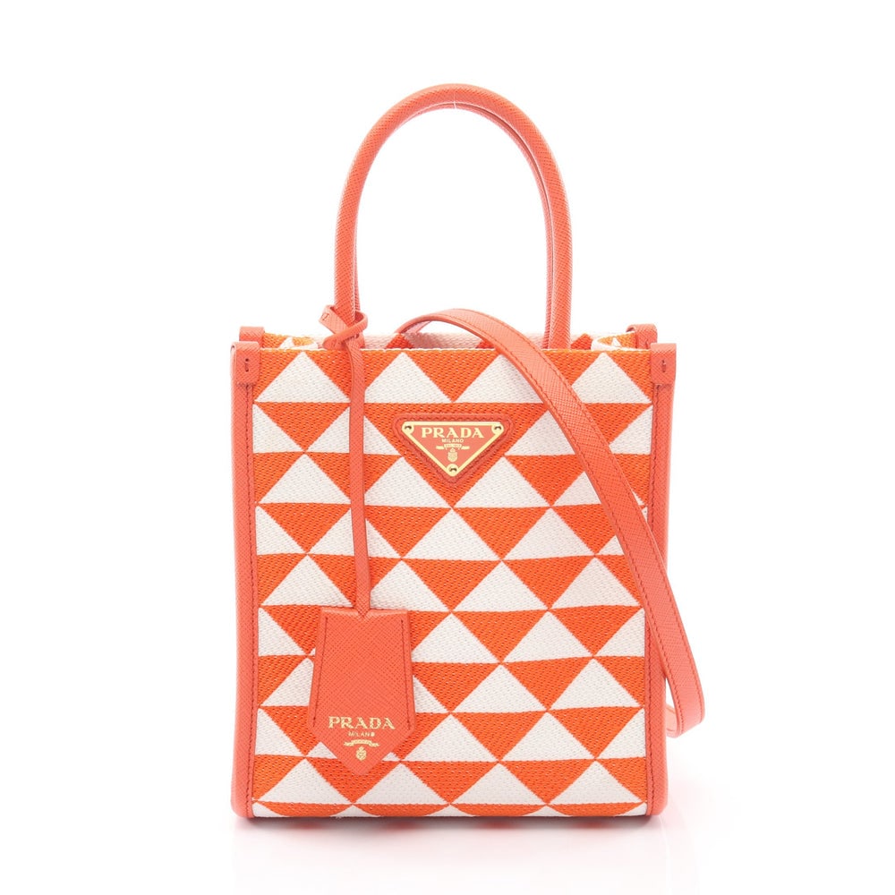 Prada Triangle Jacquard Mini 2Way: Authentic and authenticated Prada Triangolo Jacquard Symbol Embroidery Mini 2WAY handbag in orange white canvas and saffiano leather. Model 1BA355. Includes shoulder strap and key ring crochet.