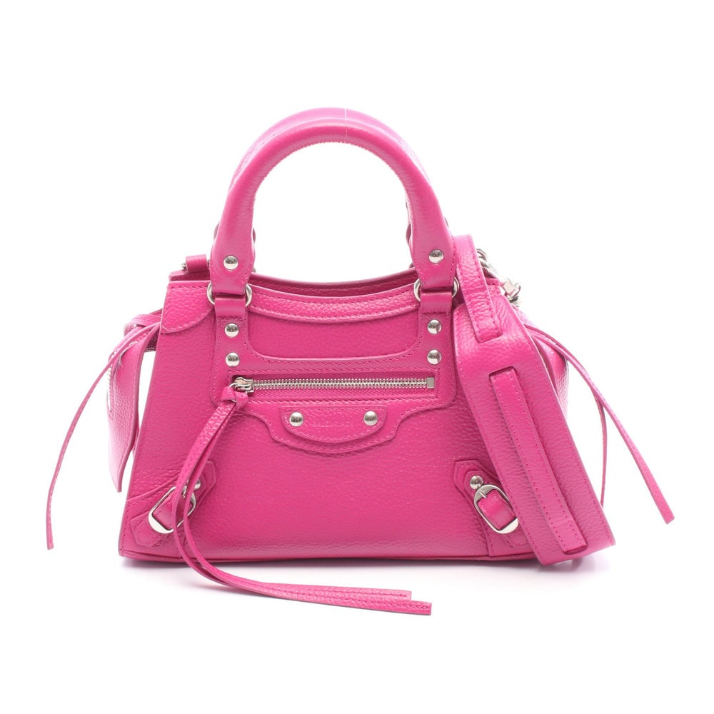 Balenciaga Neo Classic Nano Pink Purple: Pink purple leather Balenciaga Neo Classic Nano 2-way handbag. Includes shoulder strap. Approx. 18 x 11 x 7.5 cm; strap 88-131 cm. Model 638527. Authentic and authenticated.