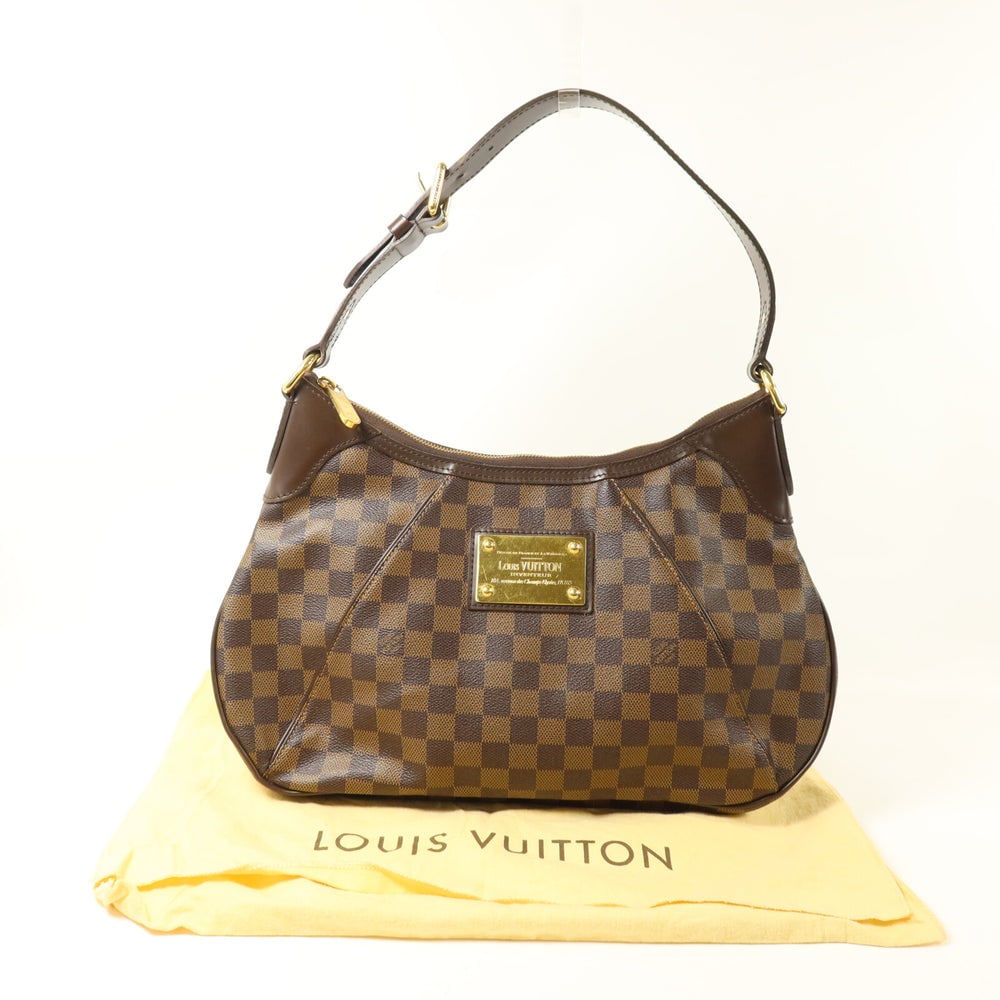 LV Thames PM Damier Ebene: Thames PM shoulder bag N48180 in brown Damier Ebene coated canvas. Includes storage bags. Size 32 x 19 x 5.5 cm.