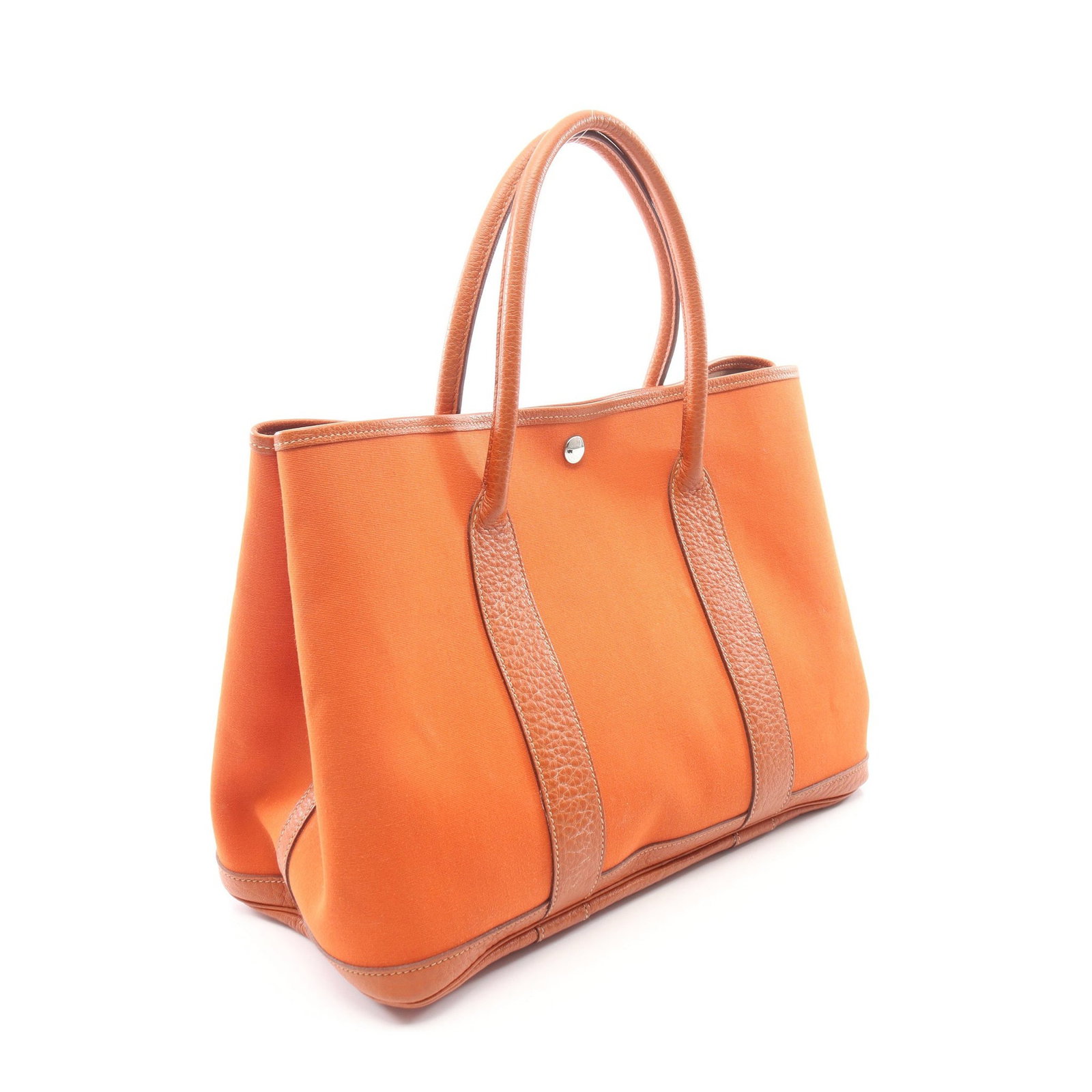 Hermes Garden Party PM Potiron: Garden Party PM tote in orange brown Toile Officier and buffalo leather with silver hardware. Size 36 x 25 x 17 cm.