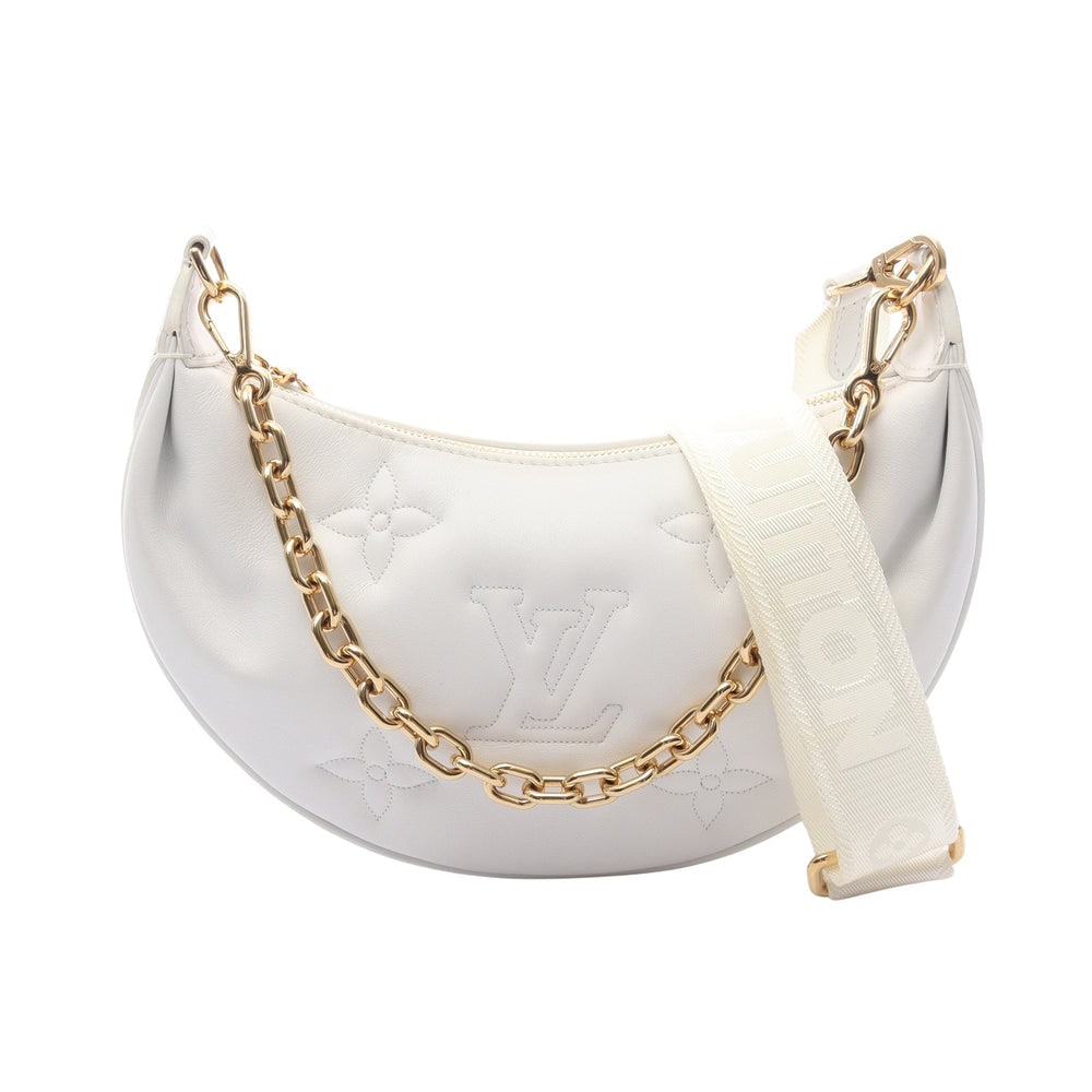 LV Over The Moon White: White leather Over-The-Moon Bubble Glam Snow 2-way chain handbag with shoulder strap. Approx. 25 x 15.5 x 6.5 cm; handle 41 cm; strap 82-118 cm. Model M59959. Authentic and authenticated.