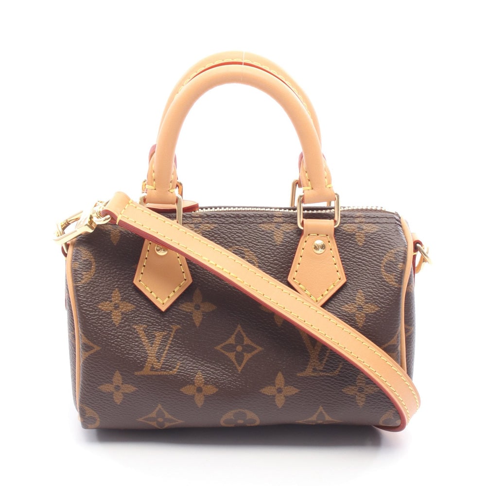 LV Nano Speedy Brown: Brown Monogram PVC leather Nano Speedy 2-way handbag with shoulder strap. Approx. 16 x 10 x 7.5 cm; handle 20 cm; strap 96-111 cm. Model M81085. Authentic and authenticated.