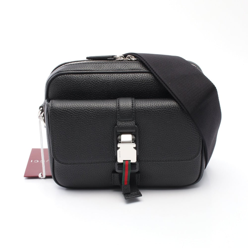 Gucci Web Stripe Shoulder Black: Black leather Gucci Web Stripe shoulder bag. Approx. 23 x 18 x 2.5/4 cm; strap 88-140 cm. Model 816751AAEF61042. Authentic and authenticated.
