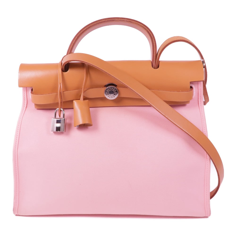 Hermes Herbag PM Rose Sakura: Rose Sakura Toile officier canvas 2 way bag with PHW; includes key cadena and pouch; W30 x H24 x D11 cm. Authentic and authenticated.
