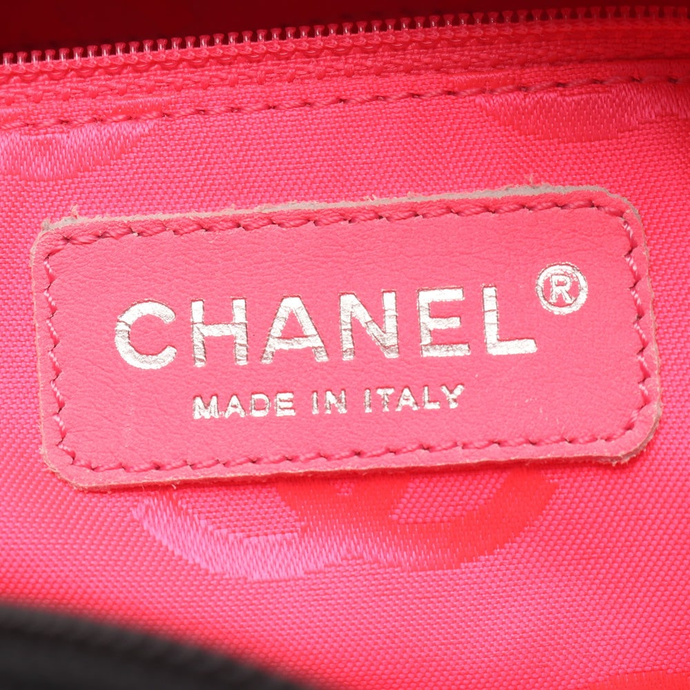 Chanel Cambon Bowling Bag: Black leather and patent shoulder bag.