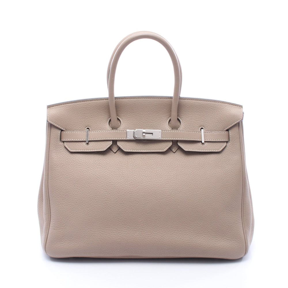 Hermes Birkin 35 Tourtiere: Beige clemence leather handbag with silver hardware. Includes crochet padlock and keys. 35 x 28 x 18 cm.