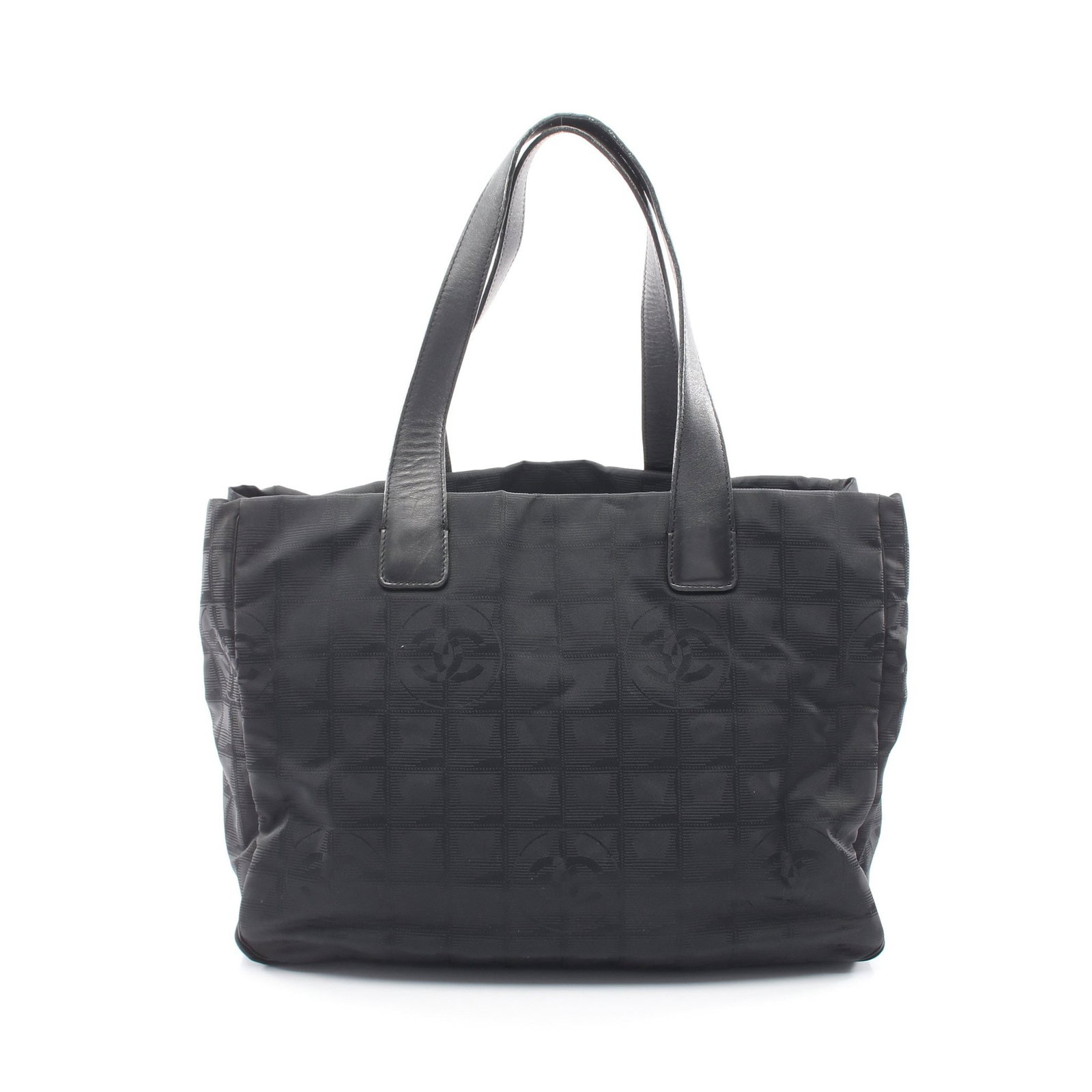 Chanel New Travel Line MM Nylon Tote Black: Authentic and authenticated Chanel New Travel Line MM tote in black nylon canvas and leather with black hardware. Model A15991 with serial seal and serial 667****. Approx. 25H x 33/34W x 14.5D cm