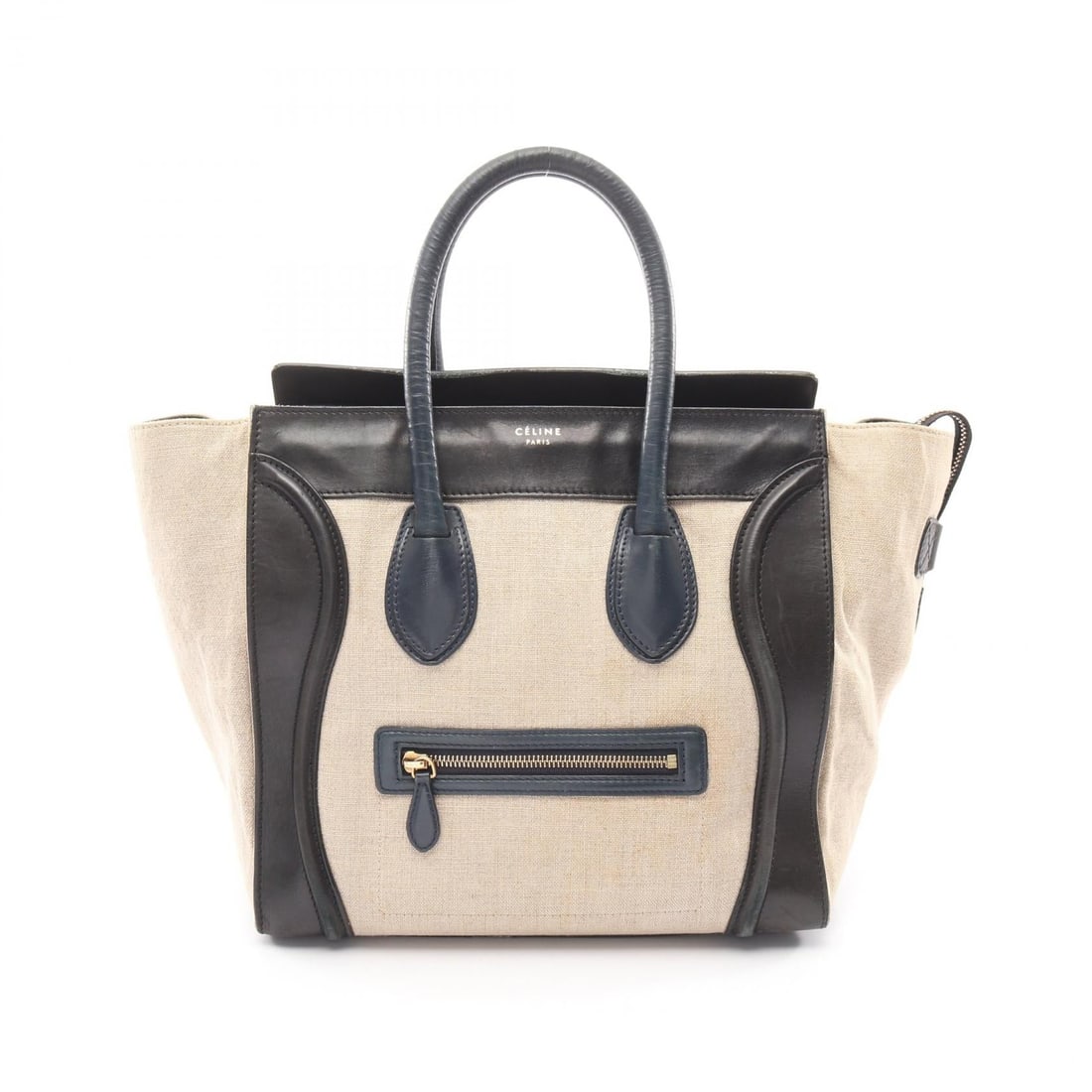 Celine Luggage Mini Shopper Tote: Authentic and authenticated Celine Luggage Mini Shopper handbag in beige/black/navy canvas and leather. Model 165212. Approx. 29H x 50/30W x 17D cm with 49 cm handle. No accessories listed.