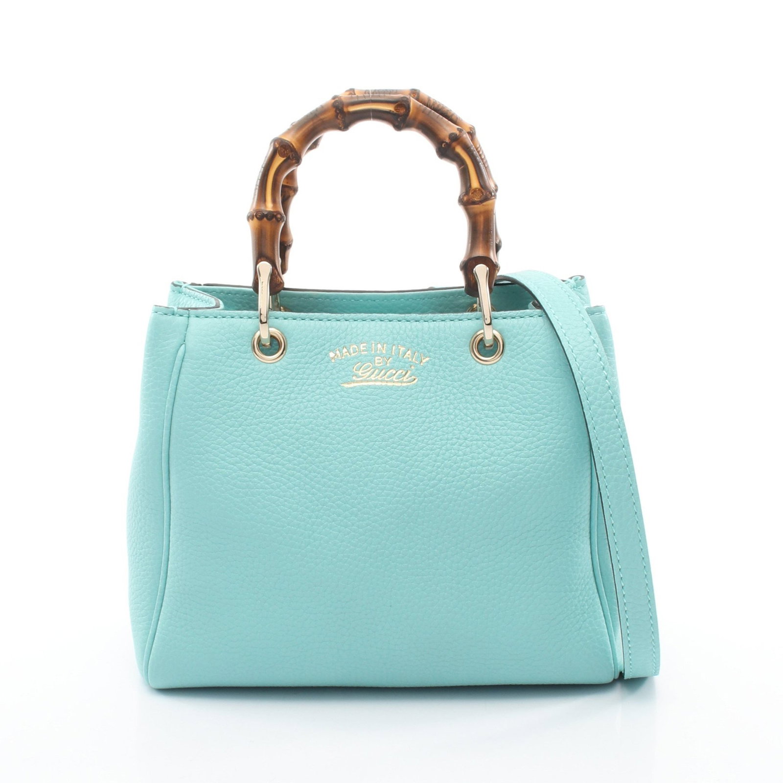 Gucci Bamboo Mini Shopper Blue: Authentic and authenticated Gucci Bamboo Mini shopper 2WAY handbag in turquoise blue leather. Model 368823. Approx. 17H x 18/20.5W x 9D cm with 24 cm handle and 118-128 cm strap.