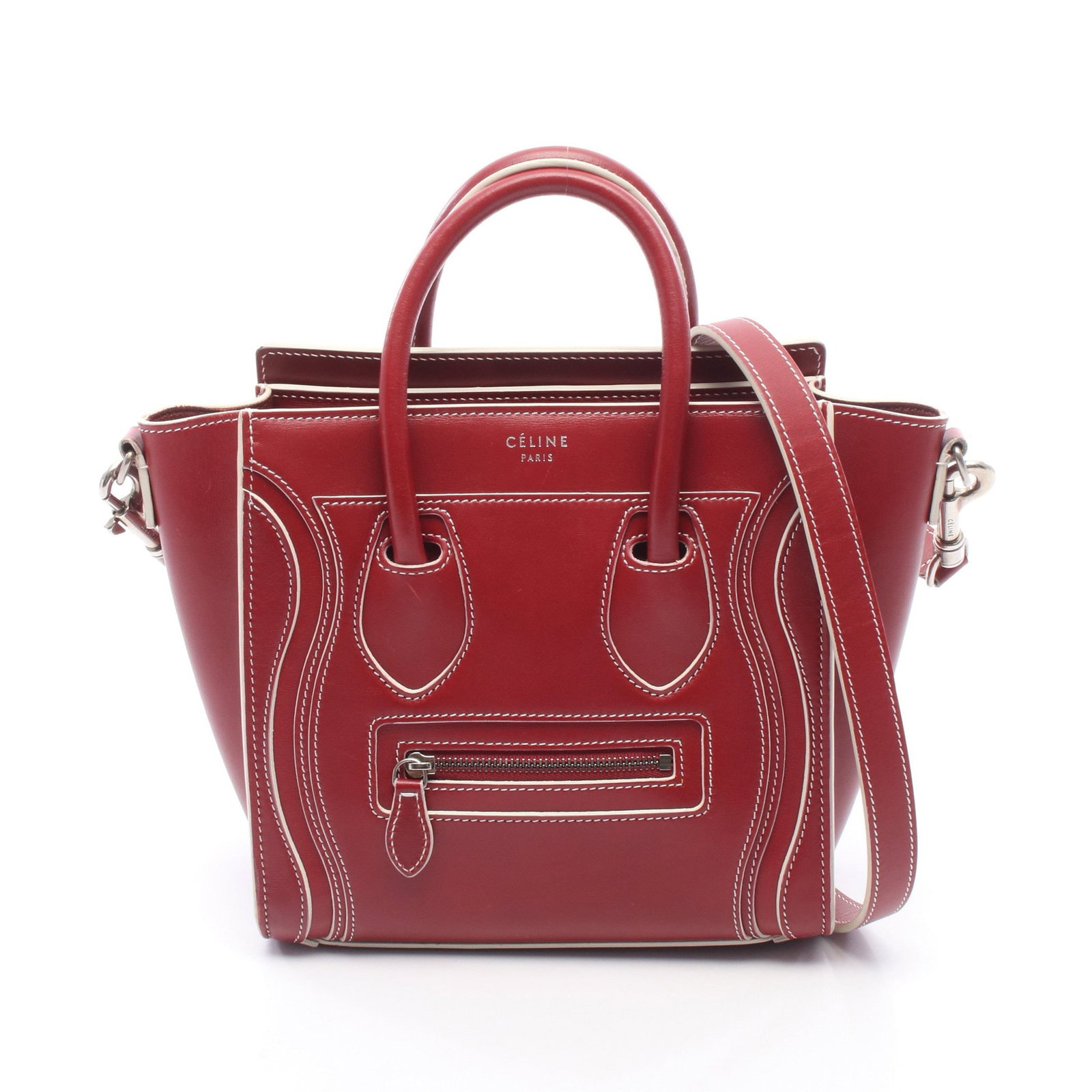 Celine Luggage Nano Shopper Red White: Authentic and authenticated Celine Luggage Nano shopper 2WAY handbag in red and white leather. Model 168243. Approx. 20H x 27/20W x 9D cm with 30 cm handle and 119 cm strap.