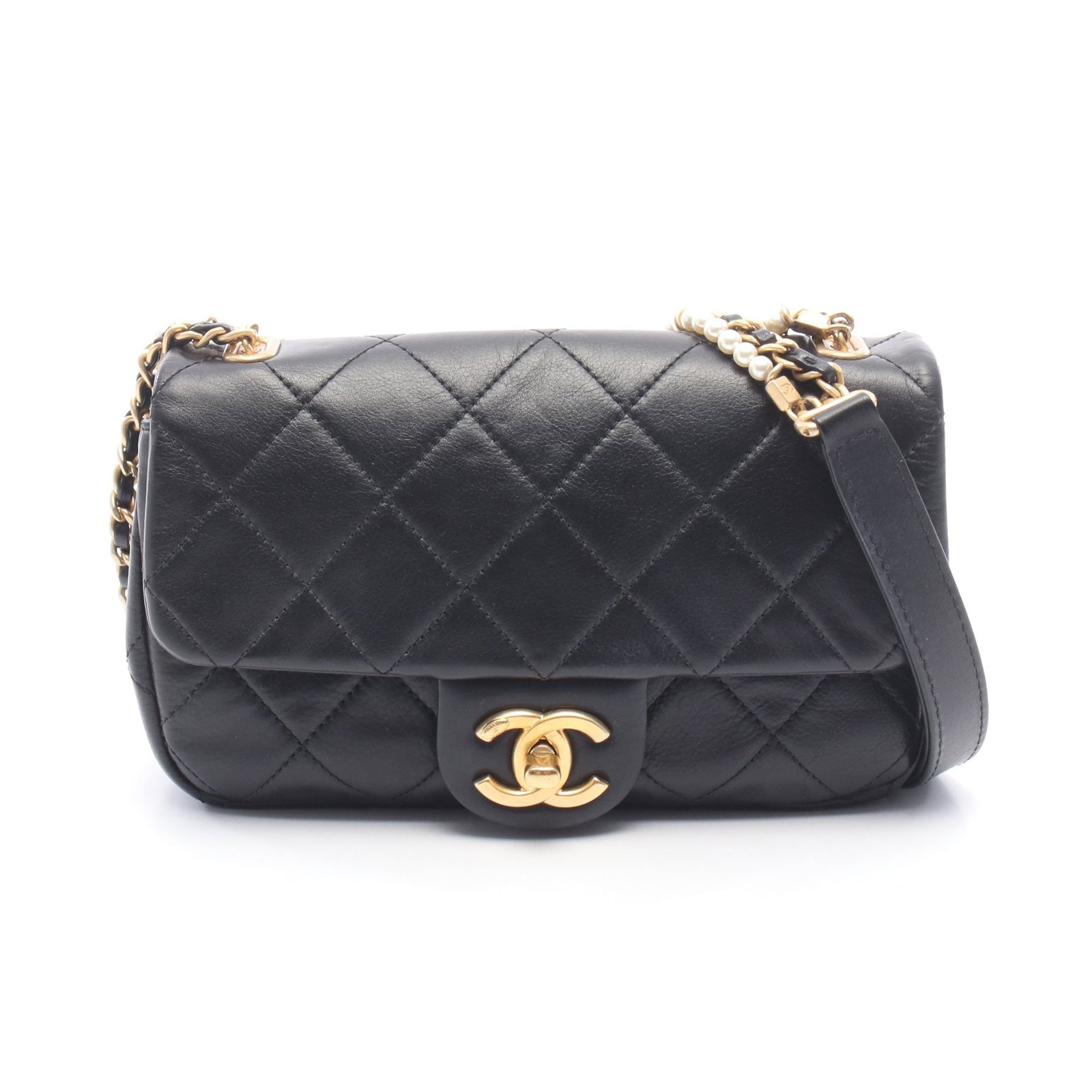 Chanel Chain Shoulder Bag Black: Authentic and authenticated Chanel Matelasse chain shoulder bag in black leather with gold hardware. Model AS2210. Approx. 13H x 20/19W x 5D cm with 115 cm strap. Includes guarantee card and serial