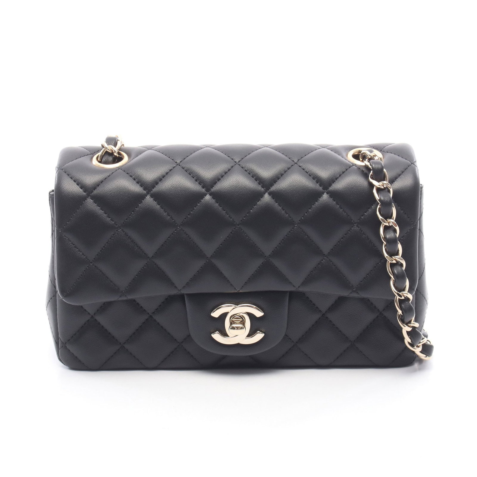 Chanel Mini Matelasse 20 Black: Authentic and authenticated Chanel Mini Matelasse 20 chain shoulder bag in black lambskin with gold hardware. Model A69900. Approx. 12H x 20W x 6.5D cm with 120 cm strap. Includes guarantee card and