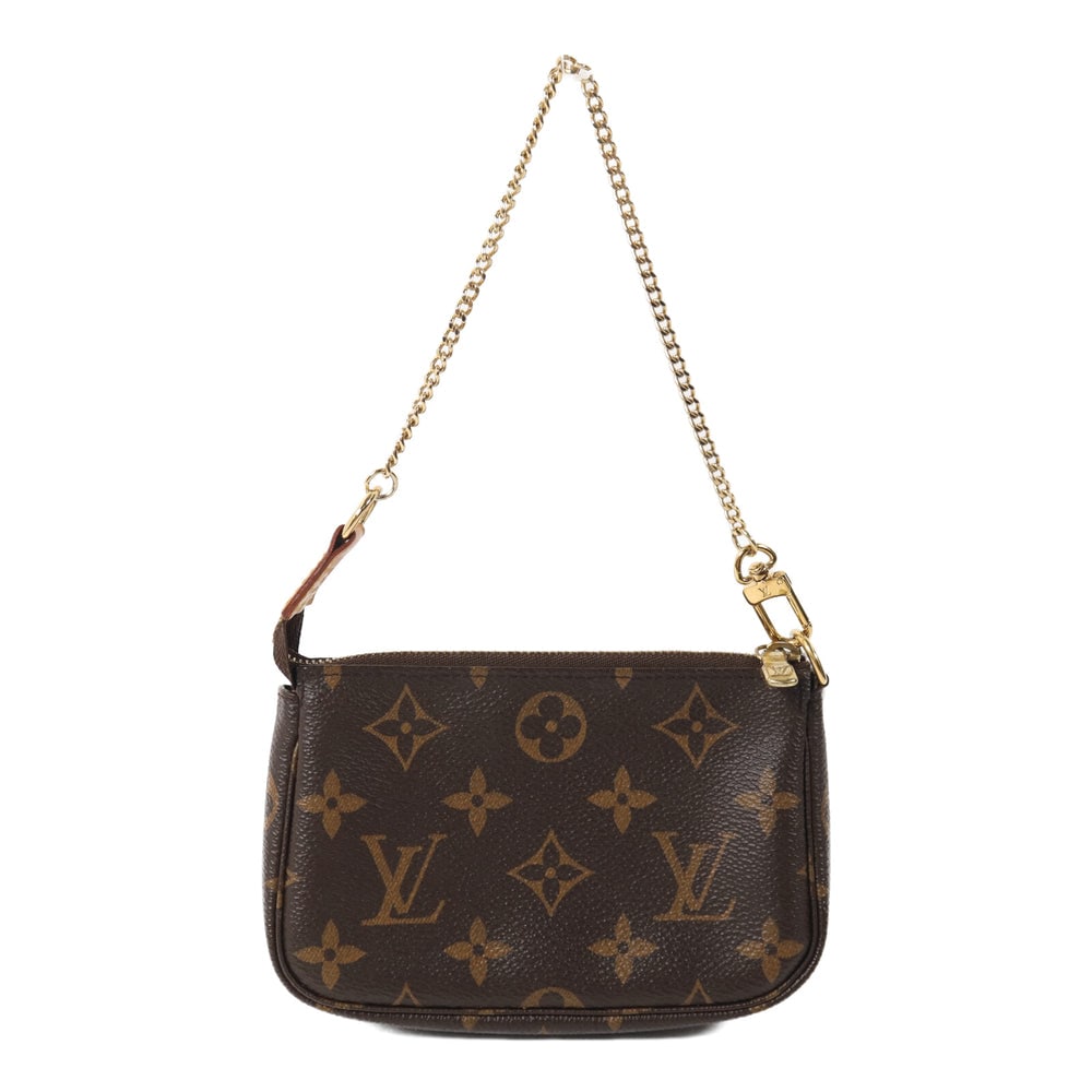 LV Mini Pochette Accessories Brown: Authentic and authenticated Louis Vuitton Mini Pochette Accessoires handbag in brown Monogram PVC coated canvas. Product no. SF1272. Approx. 14W x 11H x 3D cm with 33 cm handle.