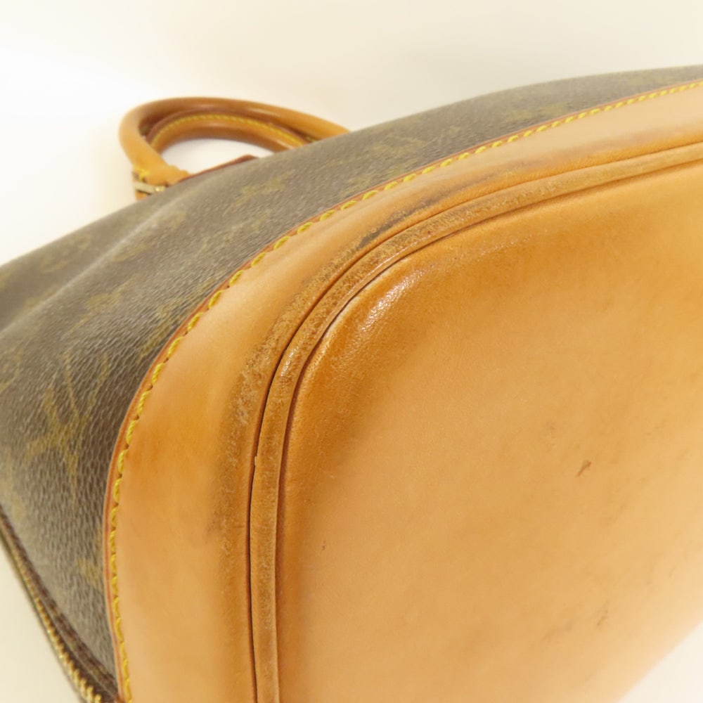 Louis Vuitton Alma Monogram Handbag - 12