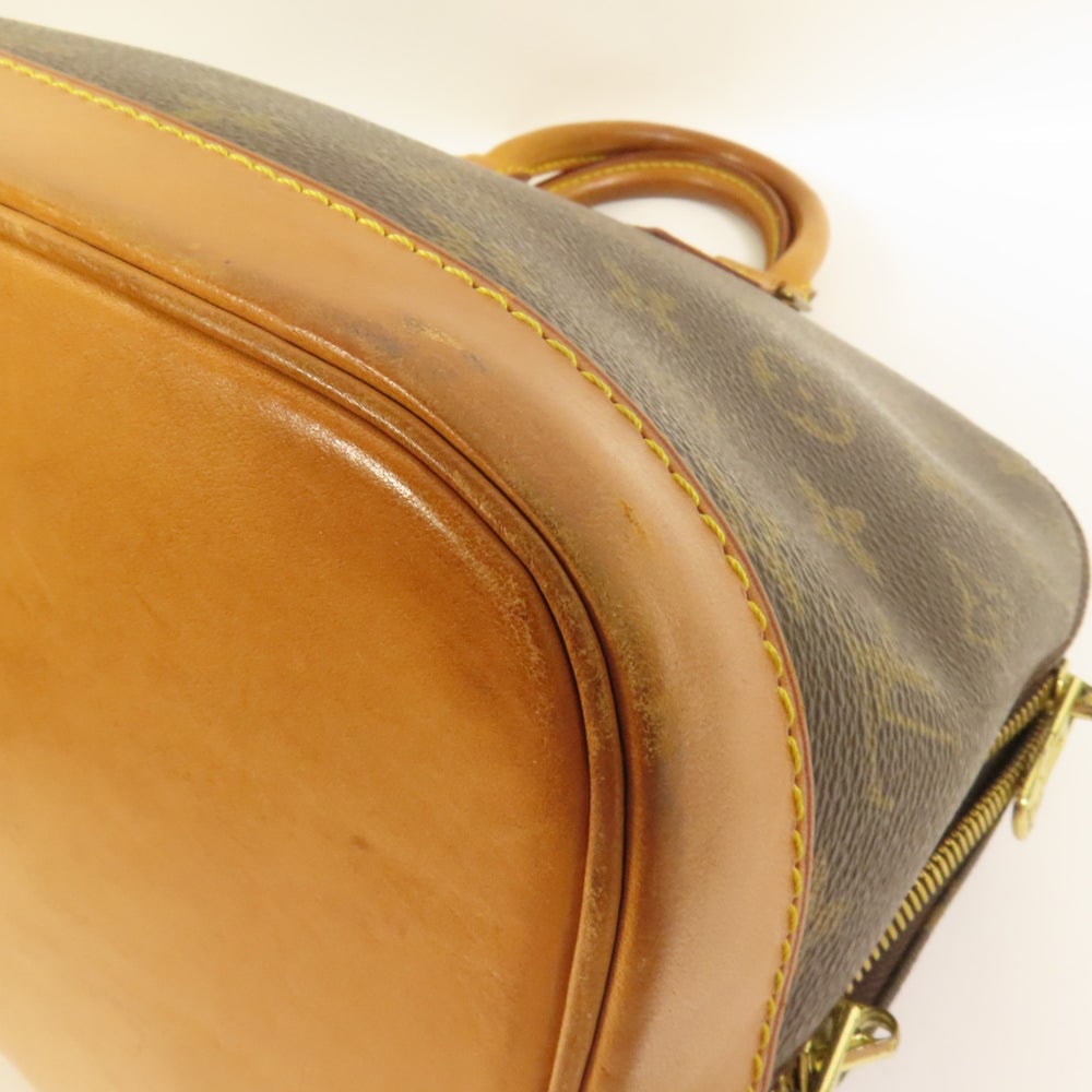 Louis Vuitton Alma Monogram Handbag - 13