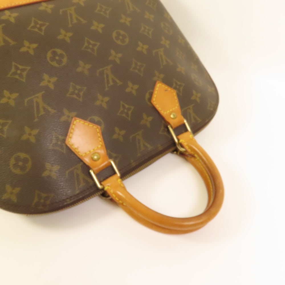 Louis Vuitton Alma Monogram Handbag - 6