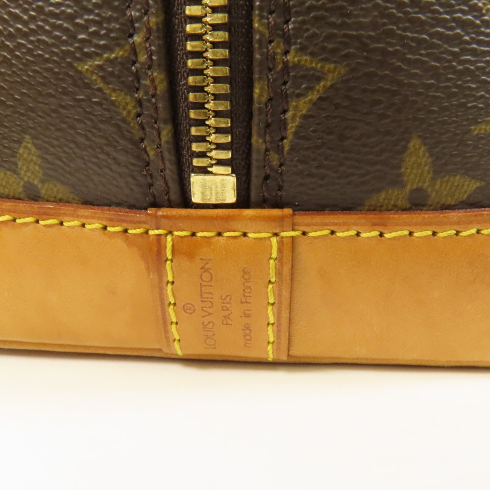 Louis Vuitton Alma Monogram Handbag - 7