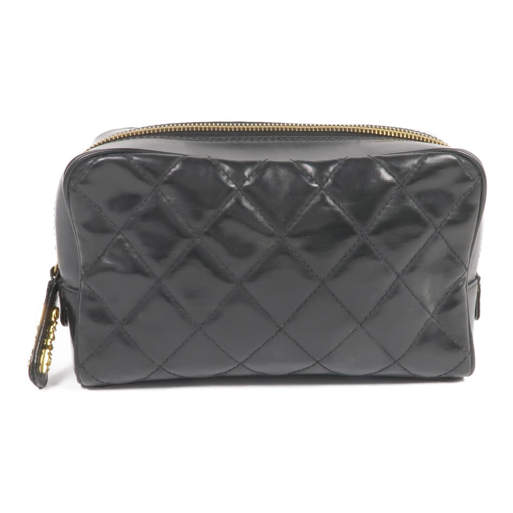 Chanel Lambskin Pouch Black: Authenticated genuine Chanel CC pouch in black lambskin leather with gold-tone hardware. Includes hologram sticker and guarantee. Product no. 3907203. Approx. W20 x H12 x D7 cm.