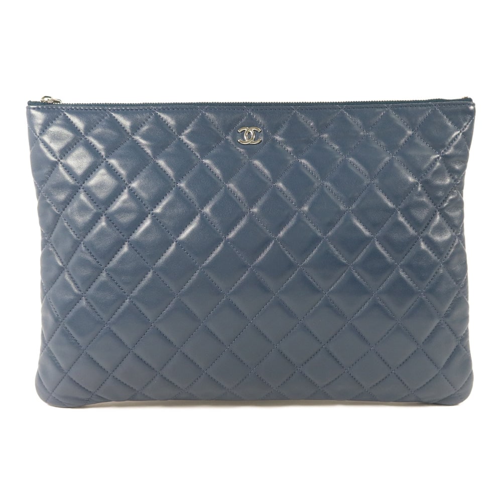 Chanel Lambskin Pouch Blue: Authenticated genuine Chanel CC pouch in blue lambskin leather with silver-tone hardware. Includes storage bags and hologram sticker. Product no. 22951631. Approx. W33.5 x H24 x D1.5 cm.