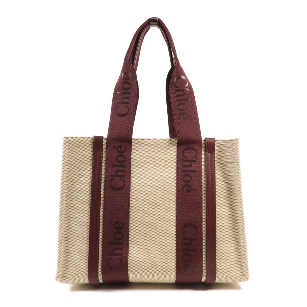 Chloe Woody Medium Tote Beige Burgundy: Authenticated genuine Chloe Woody Medium tote bag in beige and burgundy linen and leather. Includes storage bags. Approx. W36.5 x H27 x D11 cm with 54.5 cm handle. Product number not listed.