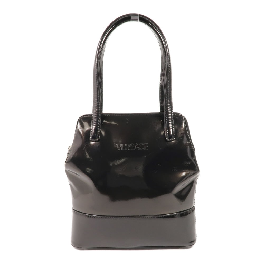 Versace Patent Handbag Black: Versace Handbag. Color: Black. Material: Patent Leather. Size: 21-26 X 28 X 6.5 Cm. Handle: 45 Cm.