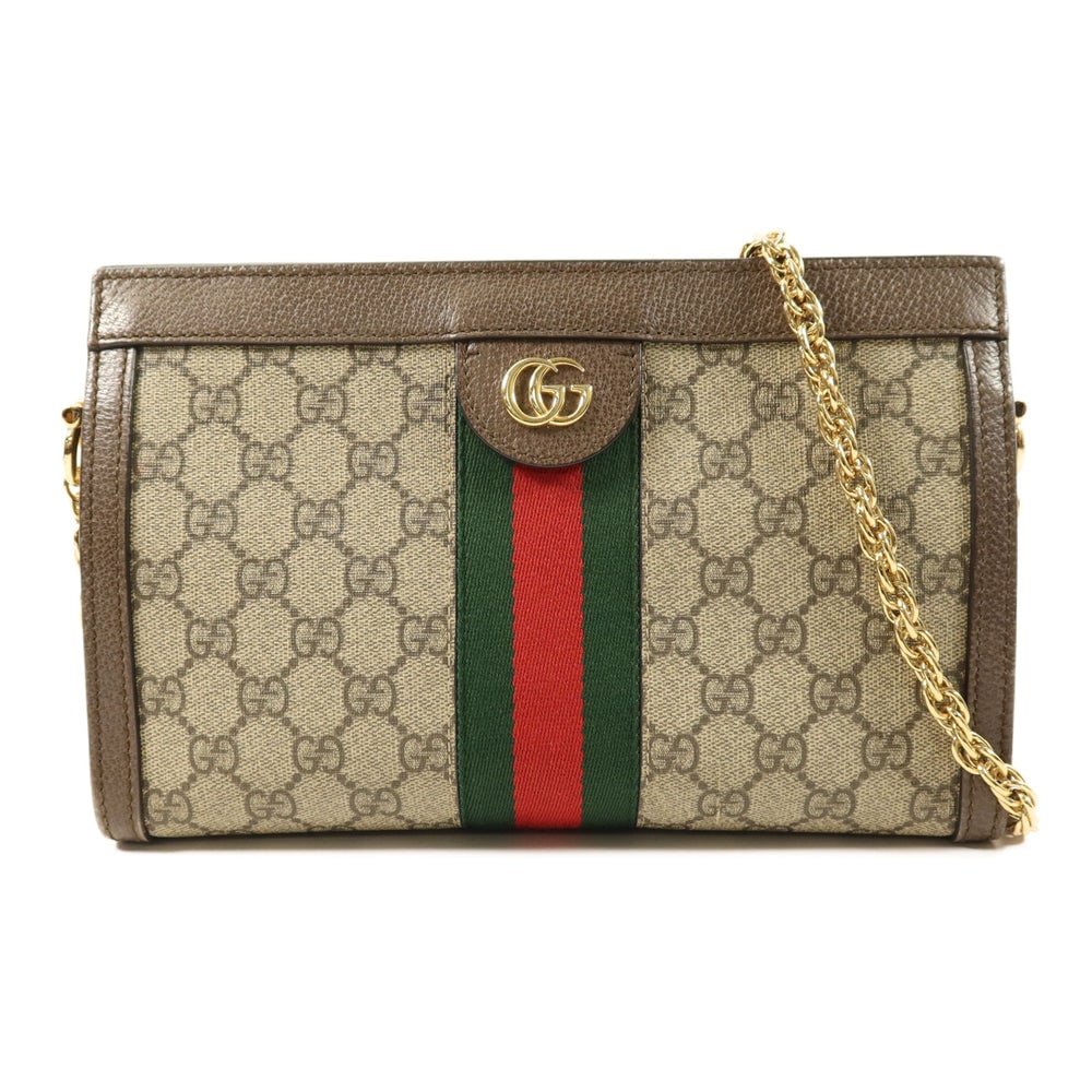 Gucci Ophidia GG Chain Shoulder: Authentic and authenticated Gucci Ophidia GG chain shoulder bag in brown PVC coated canvas. Product 486628. Approx. 26 x 17 x 8 cm with 98 cm shoulder strap. No accessories listed.