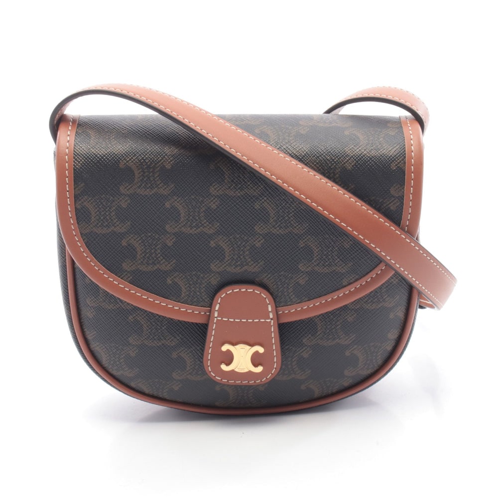 Celine Triomphe Mini Busas Bag: Authentic and authenticated Celine Triomphe Mini Busas shoulder bag in black brown PVC leather. Model 196702BZJ. Approx. 14.5 x 15.5 x 4 cm with adjustable 109-124 cm strap.