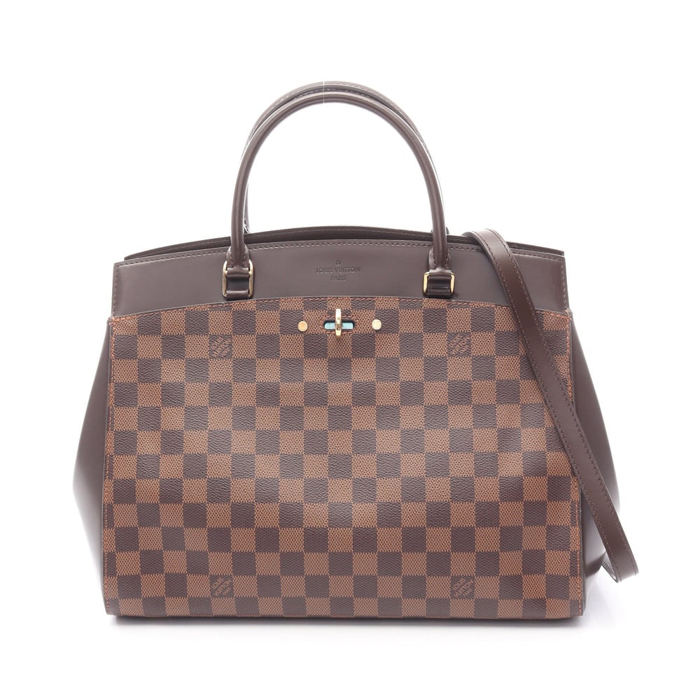 LV Rivoli MM Damier Ebene 2Way: Authentic and authenticated Louis Vuitton Rivoli MM Damier ebene 2WAY handbag in brown PVC leather. Model N41150, product CA4164. Includes shoulder strap. Approx. 27 x 31.5/33 x 15 cm.