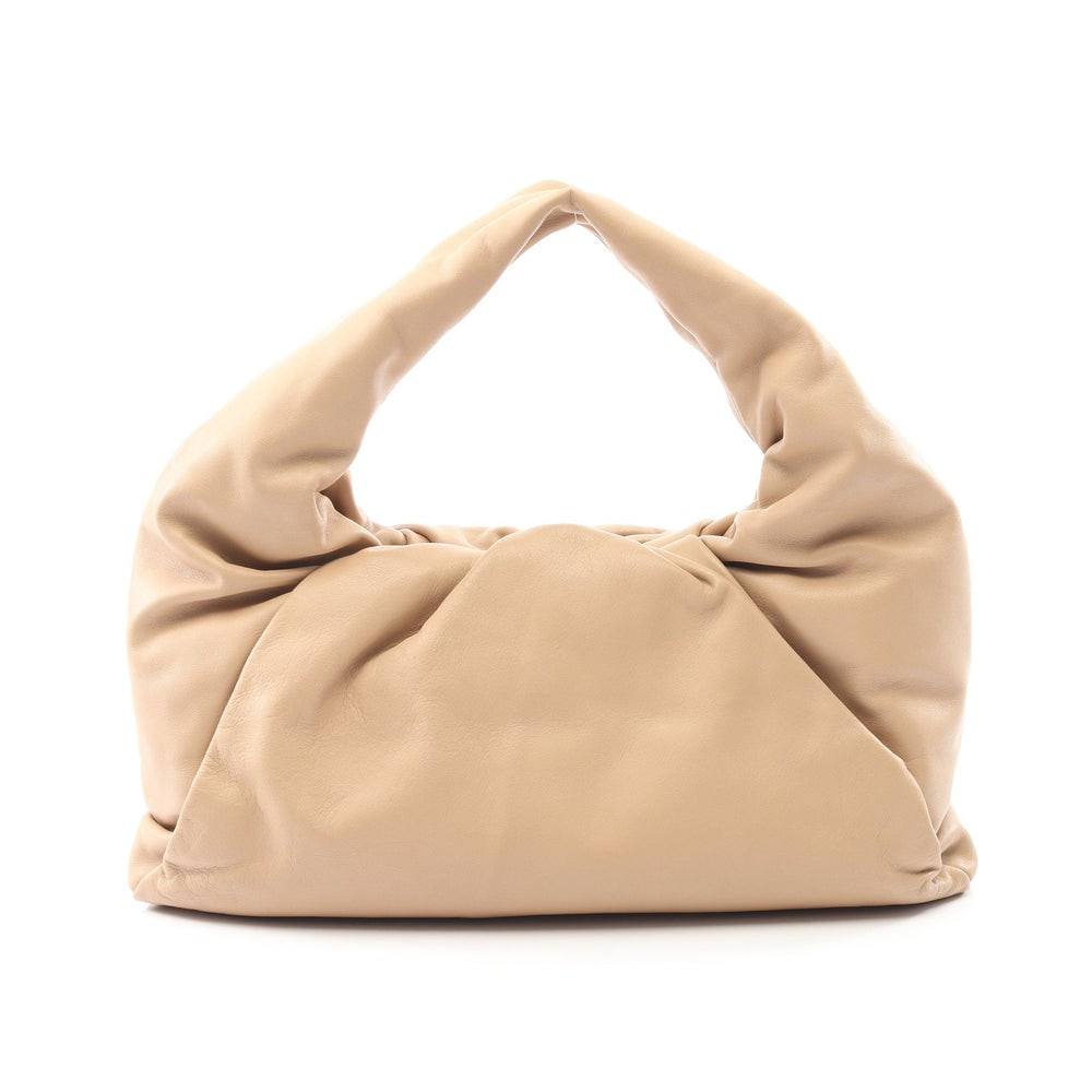 Bottega The Shoulder Pouch: Authentic and authenticated Bottega Veneta The Shoulder Pouch handbag in beige leather. Model 610524. Approx. 17 x 21/38 x 15 cm with 45 cm handle. No accessories.