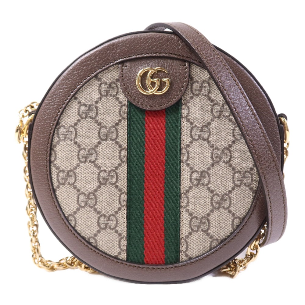 Gucci Ophidia Coated Canvas Bag: Authentic and authenticated Gucci Ophidia shoulder bag in brown PVC coated canvas. Product 520981. Includes storage box and storage bags. Approx. 18 x 18 x 4.5 cm with 128 cm shoulder.