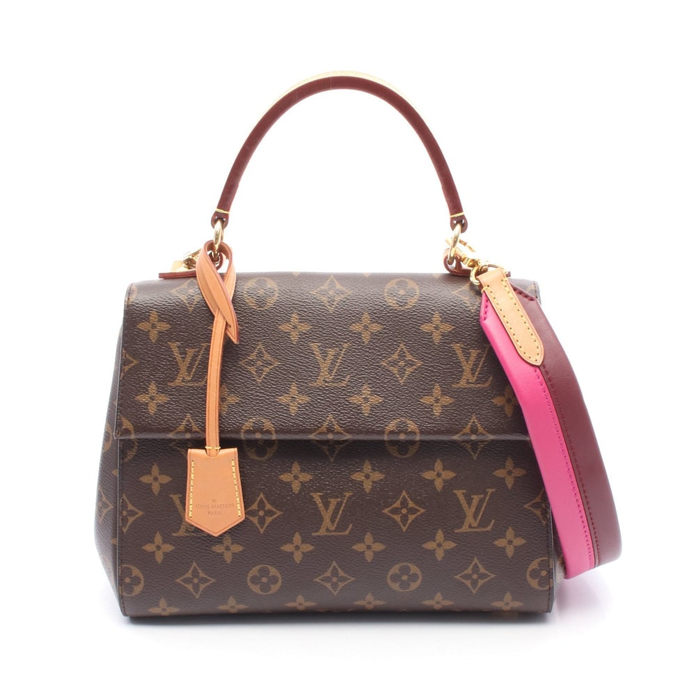 LV Cluny BB Monogram Rose: Brown Monogram PVC leather Cluny BB 2-way handbag with shoulder strap and crochet key ring. Approx. 25.5 x 19 x 9.5 cm; handle 28 cm; strap 110 cm. Model M42738. Authentic and authenticated.