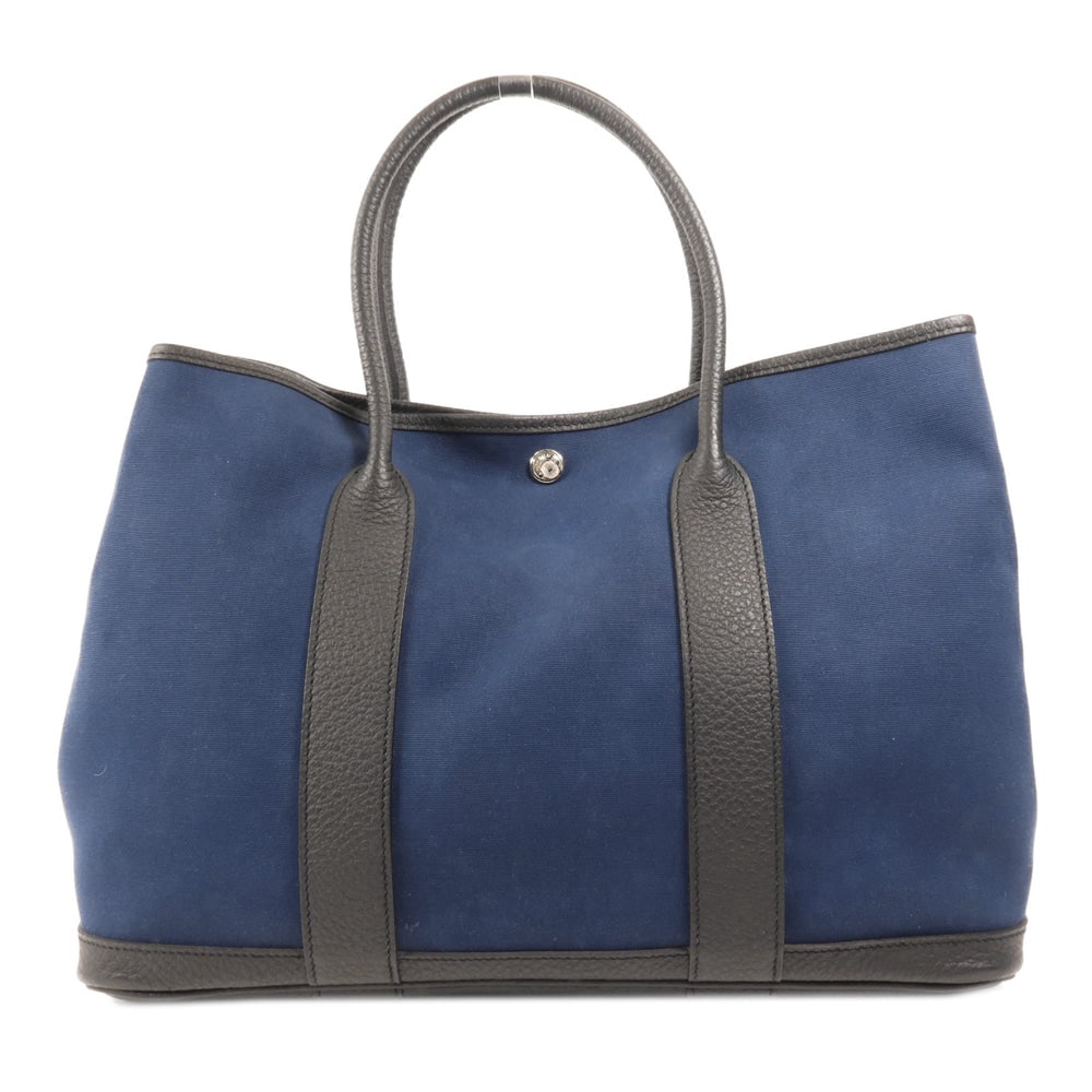 Hermes Garden Party PM Handbag: Blue and black canvas leather Garden Party PM with PHW; W36 x H27 x D17 cm; handle 43 cm. Authentic and authenticated.