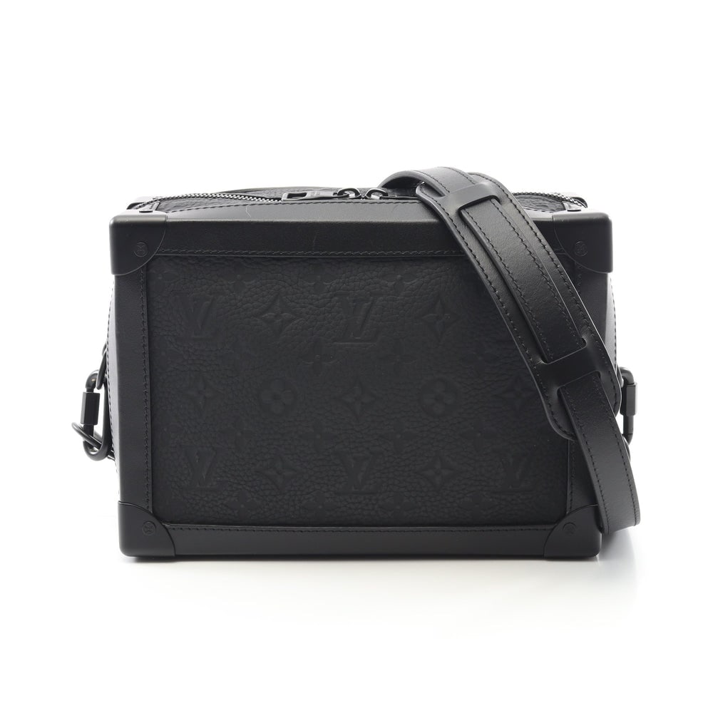 LV Soft Trunk Taurillon Noir: Black monogram taurillon leather shoulder bag; H17.5 x W24.5 x D10 cm; strap 120-135 cm. Authentic and authenticated.