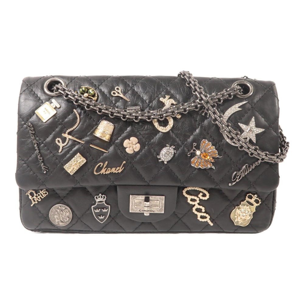 Chanel 2.55 Lucky Charm Black: Black calfskin 2.55 Reissue Lucky Charm chain shoulder bag.