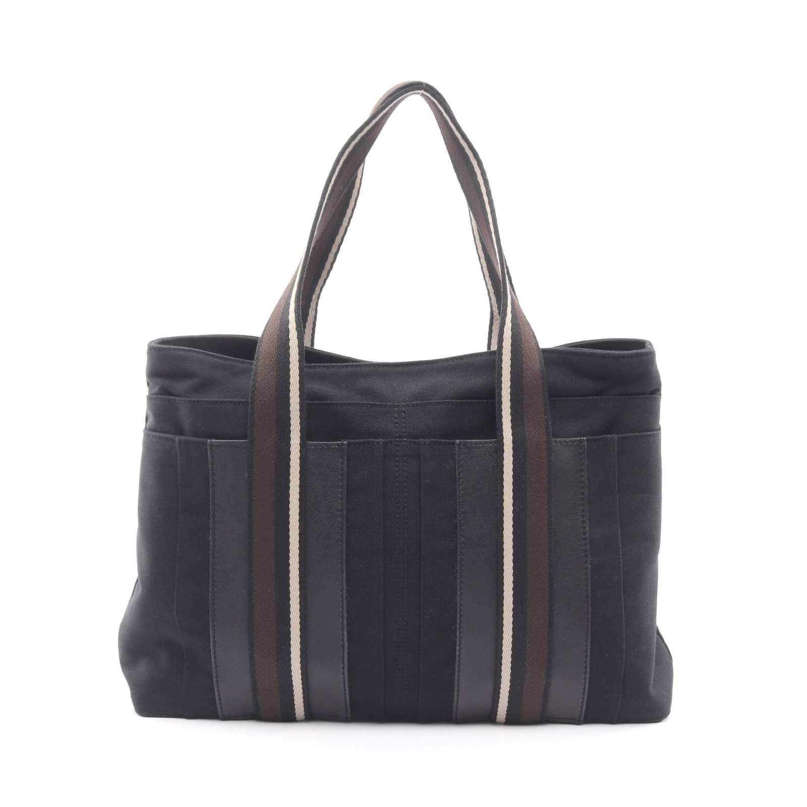 Hermes Troca MM Canvas Leather Tote Black: Authentic and authenticated Hermes Troca Horizontal MM tote handbag in black canvas and leather with silver hardware. Approx. 28H x 38/41W x 9D cm with 55 cm handle. No accessories listed.
