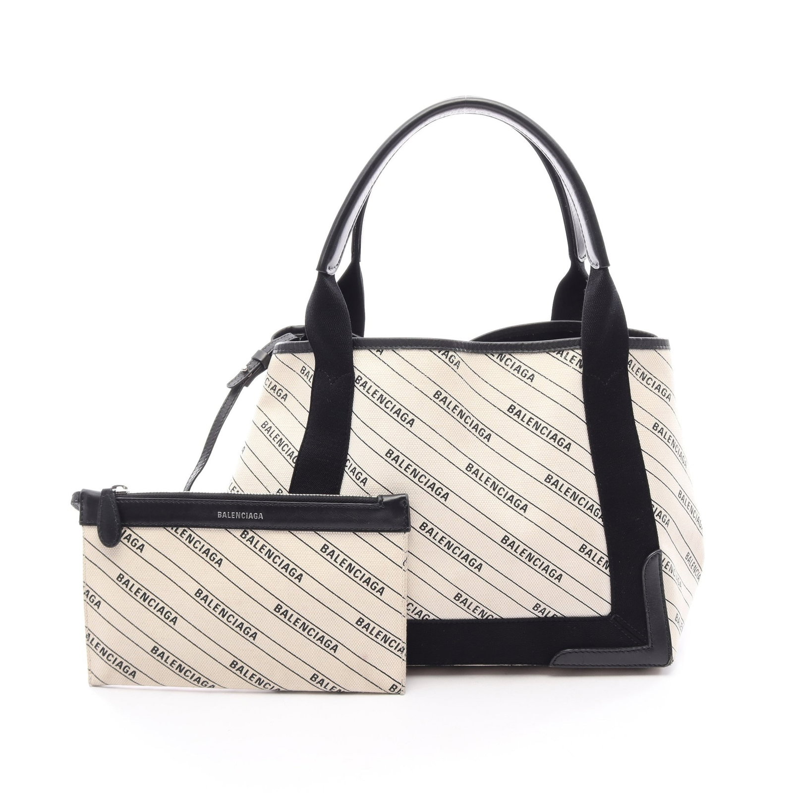 Balenciaga Navy Cabas S Canvas Tote: Authentic and authenticated Balenciaga Navy Cabas S tote handbag in ivory/black canvas and leather. Model 339933. Approx. 22H x 32/30W x 18D cm with 45 cm handle. Includes pouch.