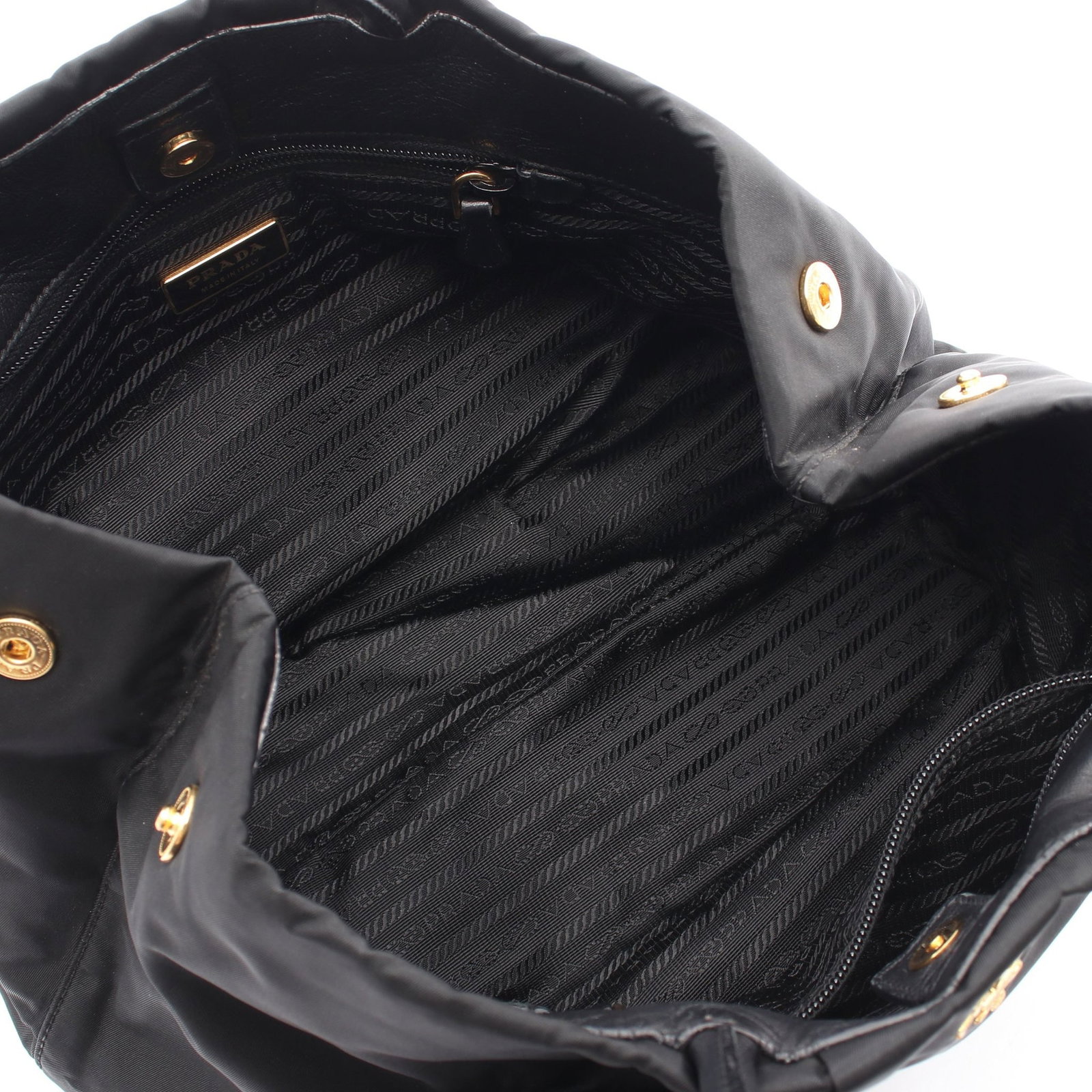 Prada Rose Nylon Leather Handbag: Authentic and authenticated Prada Rose handbag in black nylon and leather. Approx. 23H x 29/37/27W x 16D cm with 29 cm handle. No accessories listed.