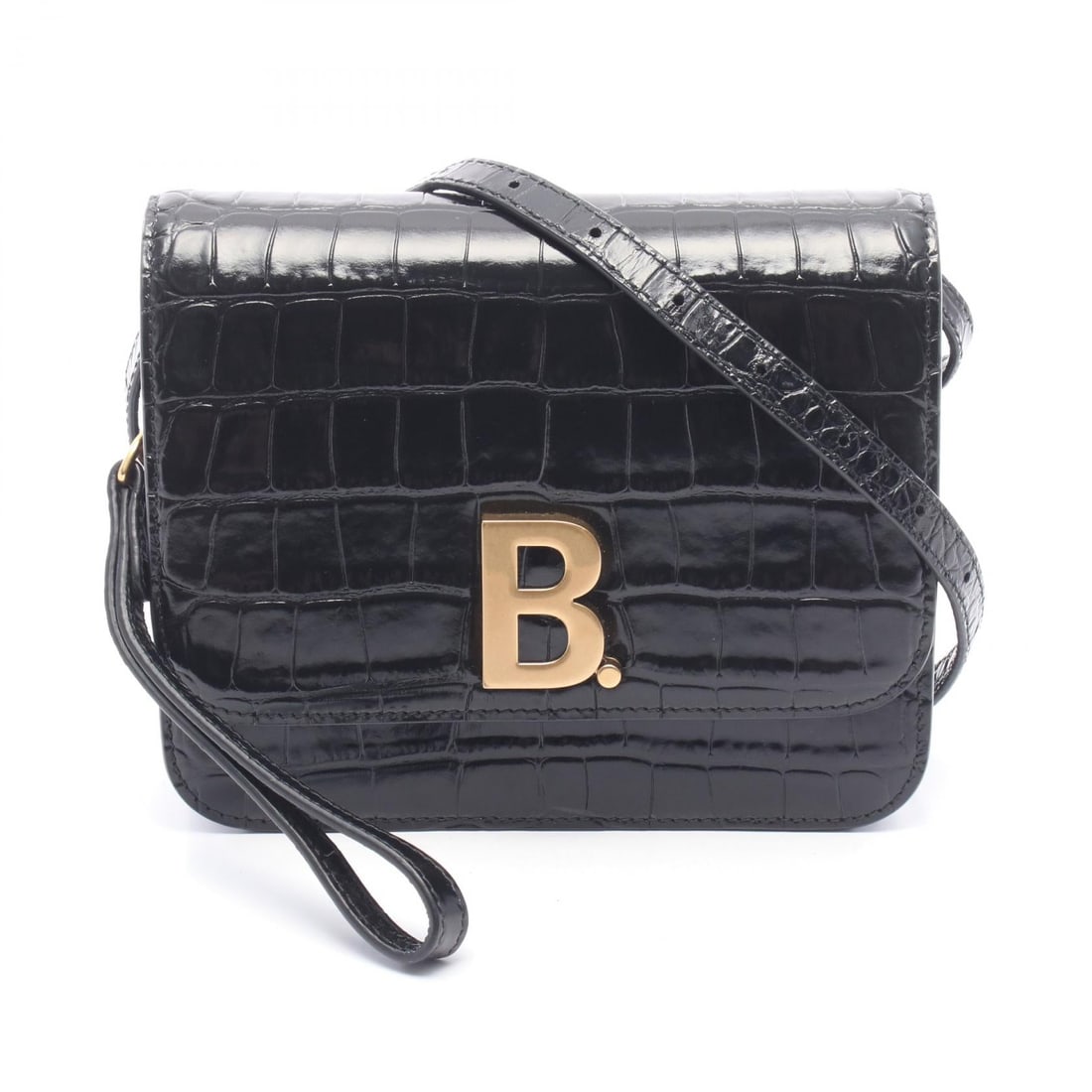 Balenciaga Croc Embossed Shoulder Bag: Authentic and authenticated Balenciaga Bead dot croc embossed shoulder bag in black leather. Model 592898. Approx. 15H x 18.5W x 2.5/2.5D cm with 39-124 cm strap and 17 cm hand strap.