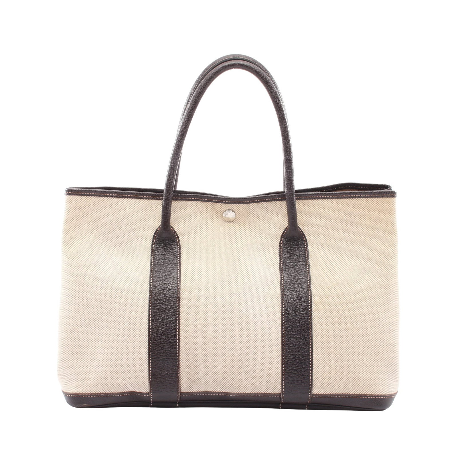 Hermes Garden Party PM Ecru Ebene: Authentic and authenticated Hermes Garden Party PM Ecru Ebene tote handbag in ivory and dark brown Toile H canvas Buffalo with silver hardware. Approx. 25H x 36W x 17D cm with 44 cm handle. ?I stamp.