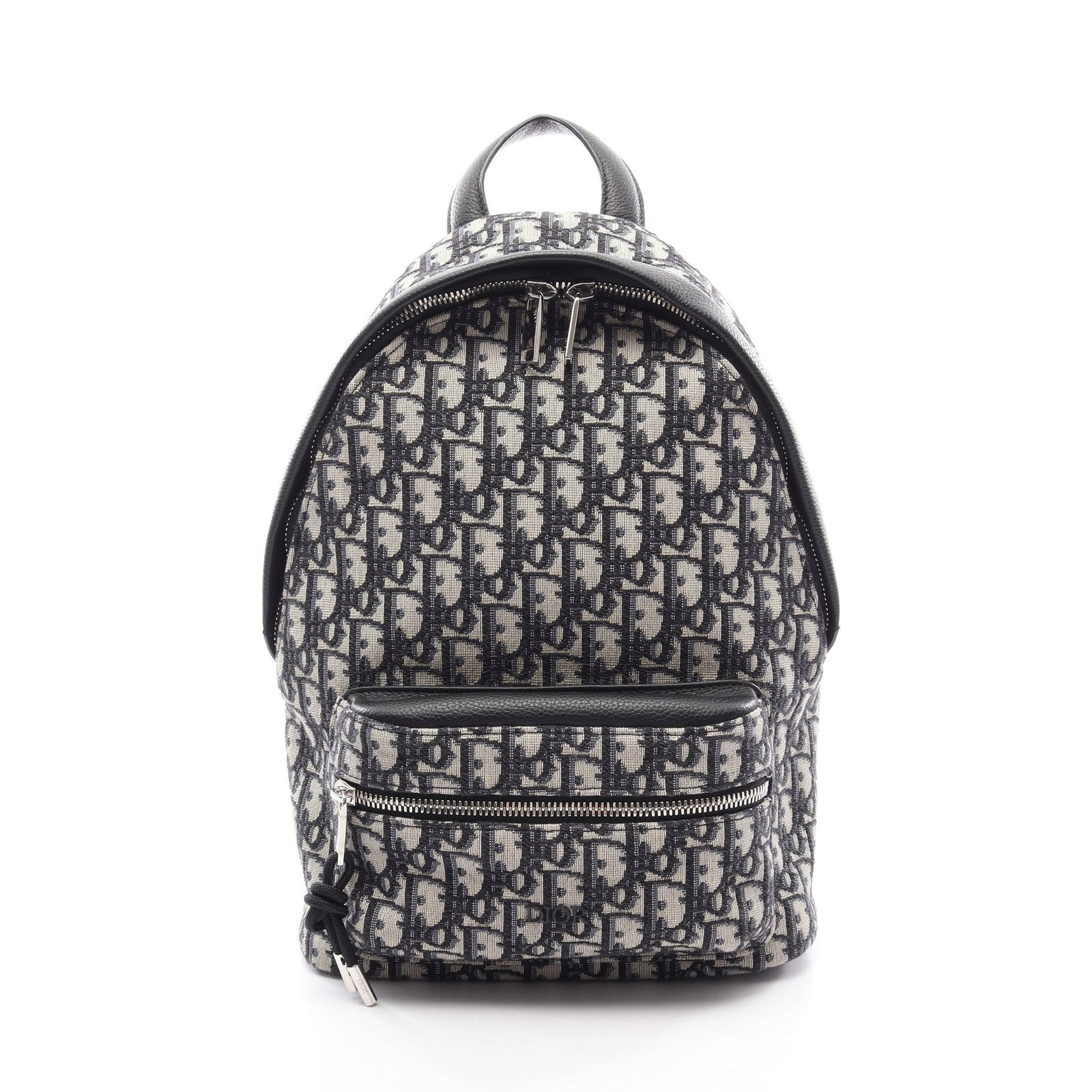 Dior Rider Kids Backpack Beige Navy: Authentic and authenticated Christian Dior Rider Oblique Jacquard Kids backpack in beige and navy canvas leather. Model 1PEBA158YKY. Approx. 35H x 23W x 10D cm with max 75 cm strap and 18 cm handle.