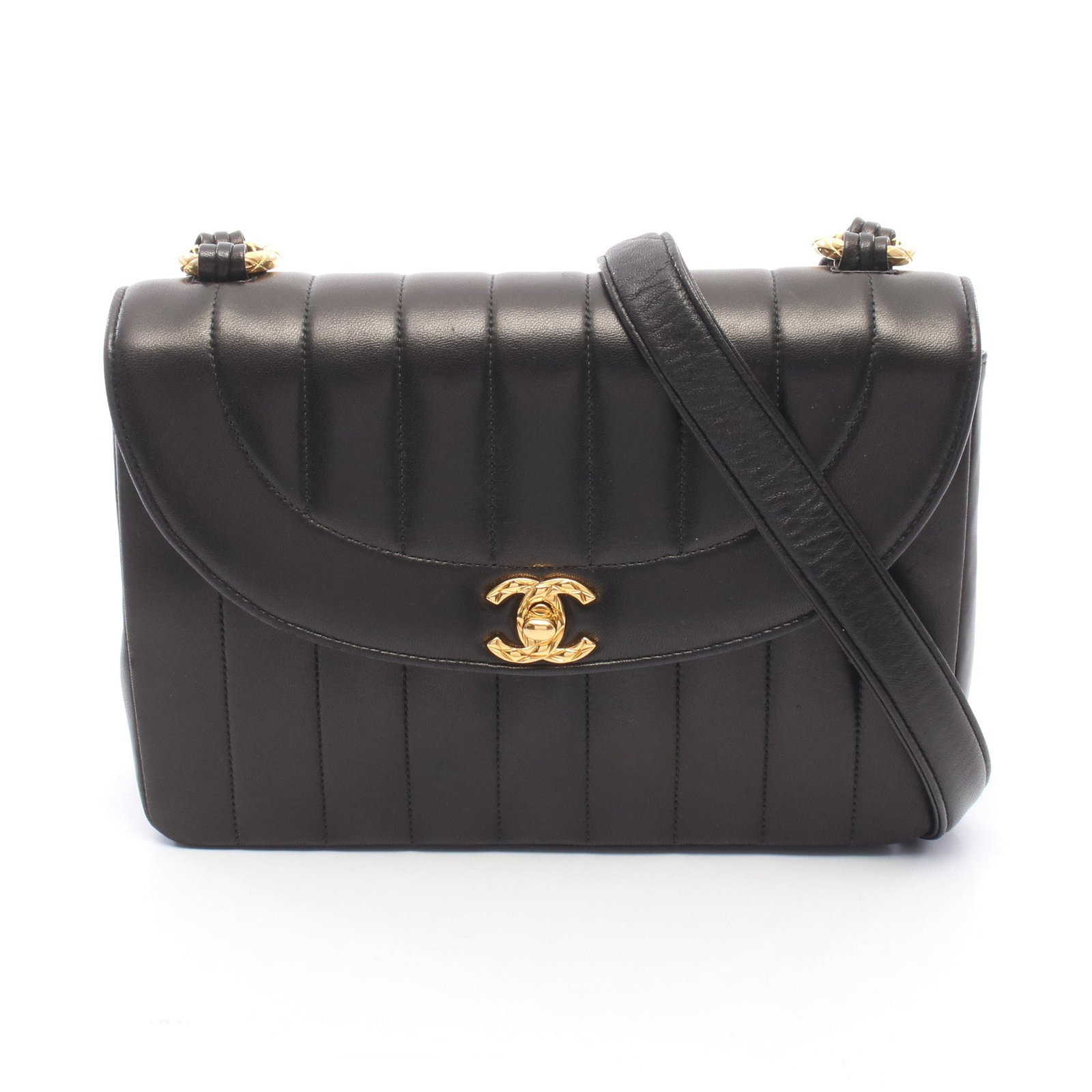 Chanel Mademoiselle Shoulder Bag: Authentic and authenticated Chanel Mademoiselle shoulder bag in black lambskin with gold hardware. Approx. 15.5H x 23W x 6.5D cm with 104 cm strap. Includes guarantee card, serial seal, and boutique