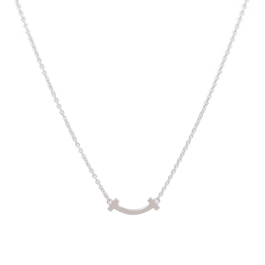 Tiffany T Smile Small Necklace WG: T Smile Small necklace in 18K white gold.