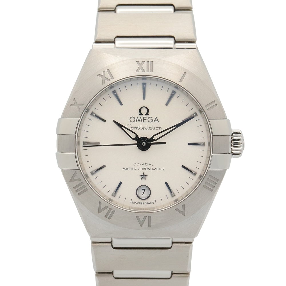 Cartier Pasha de Cartier Auto Silver: Automatic Pasha de Cartier in stainless steel with crocodile leather and silver dial. Wrist 18.5cm. Includes storage box and guarantee.
