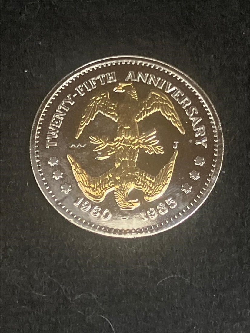 John Fitzgerald Kennedy 25Th Anniversary Token: This commemorative medal was issued in the United States between 1983 and 1985 as part of the Presidential Tokens series. It is a personality or portrait medal composed of copper-nickel, featuring a