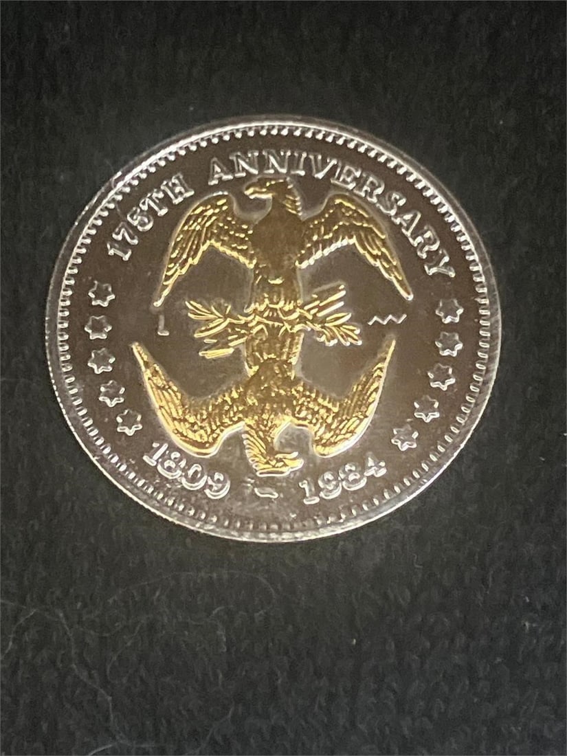 1984 Abraham Lincoln 175th Double Eagle: The 1984 Abraham Lincoln 175th Anniversary Commemorative Double Eagle Coin was issued to honor the 175th anniversary of Abraham Lincoln's birth. Struck in copper layered with 24k gold, this