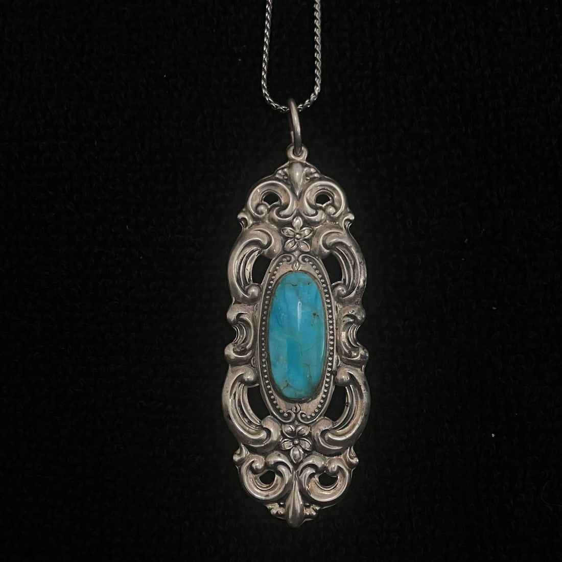 Sterling Silver Necklace - 25.6 grams: Sterling Silver Necklace with turquoise stone. 25.6 grams